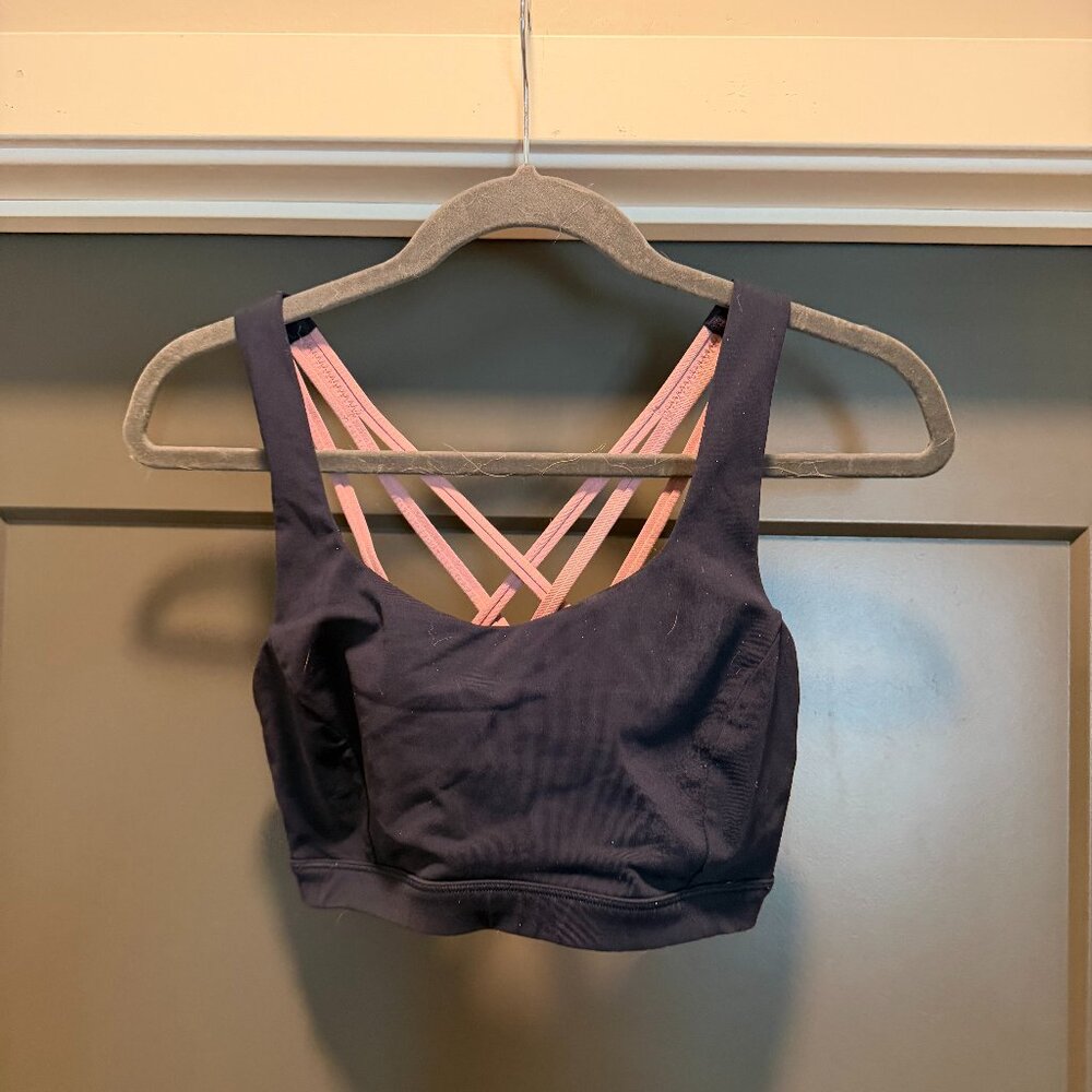 Navy and pink free to be serene sports bra
